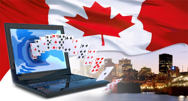 online casino canada, laptop, cards and canadian flag